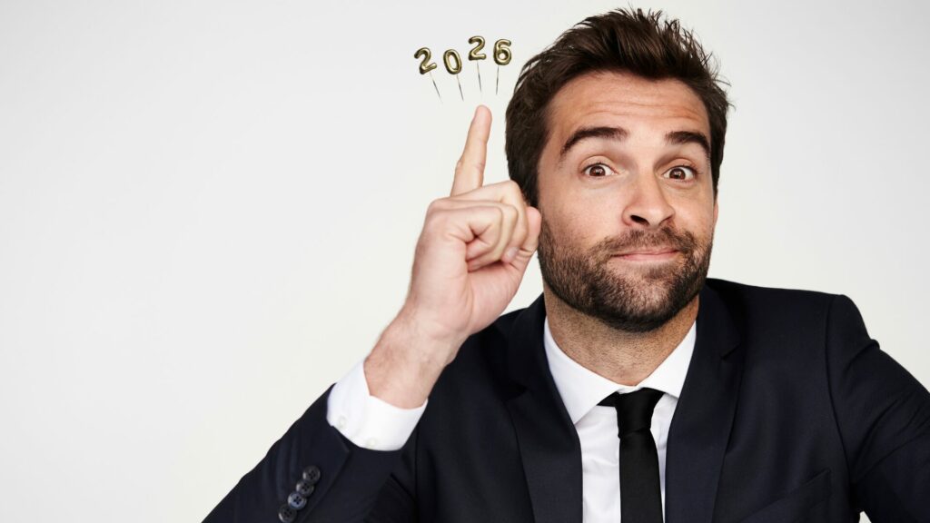 Homme tenant le chiffre 2026, symbole de la résolution d’arrêter de fumer grâce à la méthode laser LaserAddict