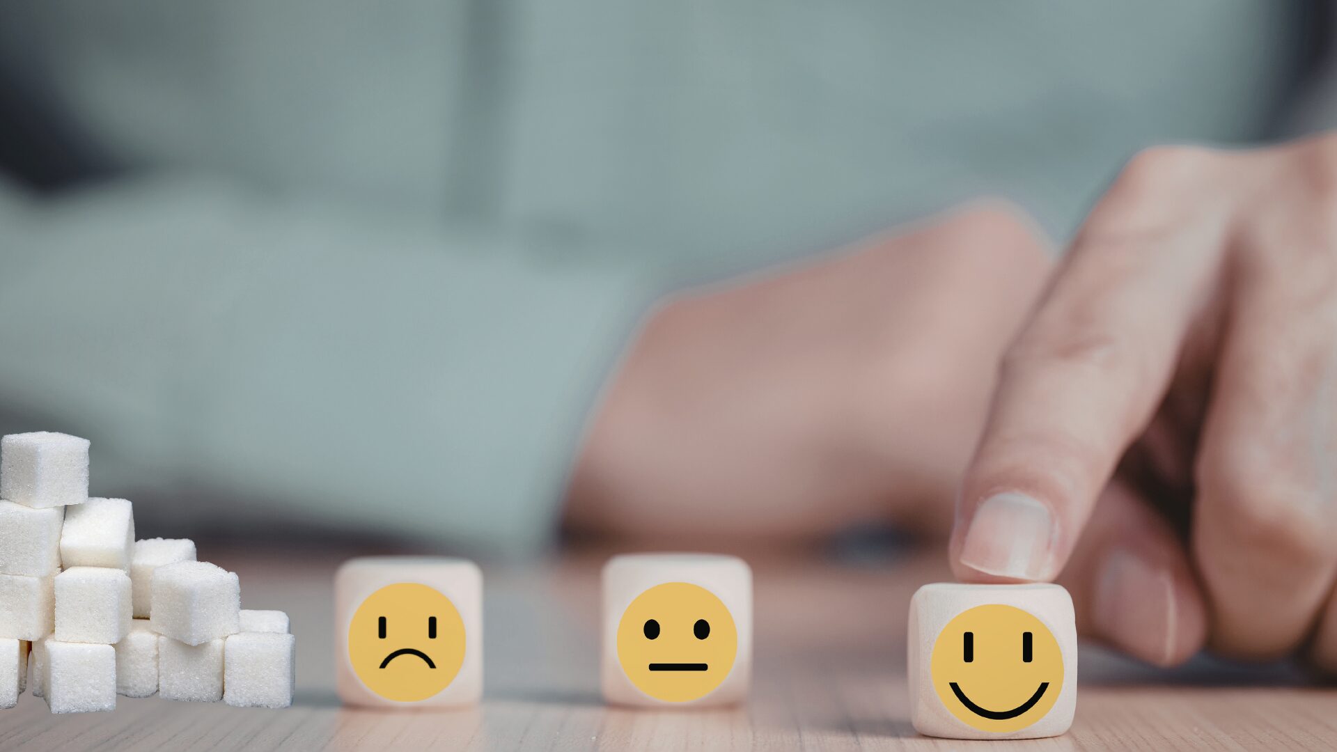 Illustration du lien entre sucre et émotions, montrant une personne partagée entre tristesse et bien-être devant des carreaux de sucre, en lien avec l’accompagnement LaserAddict contre l’addiction au sucre